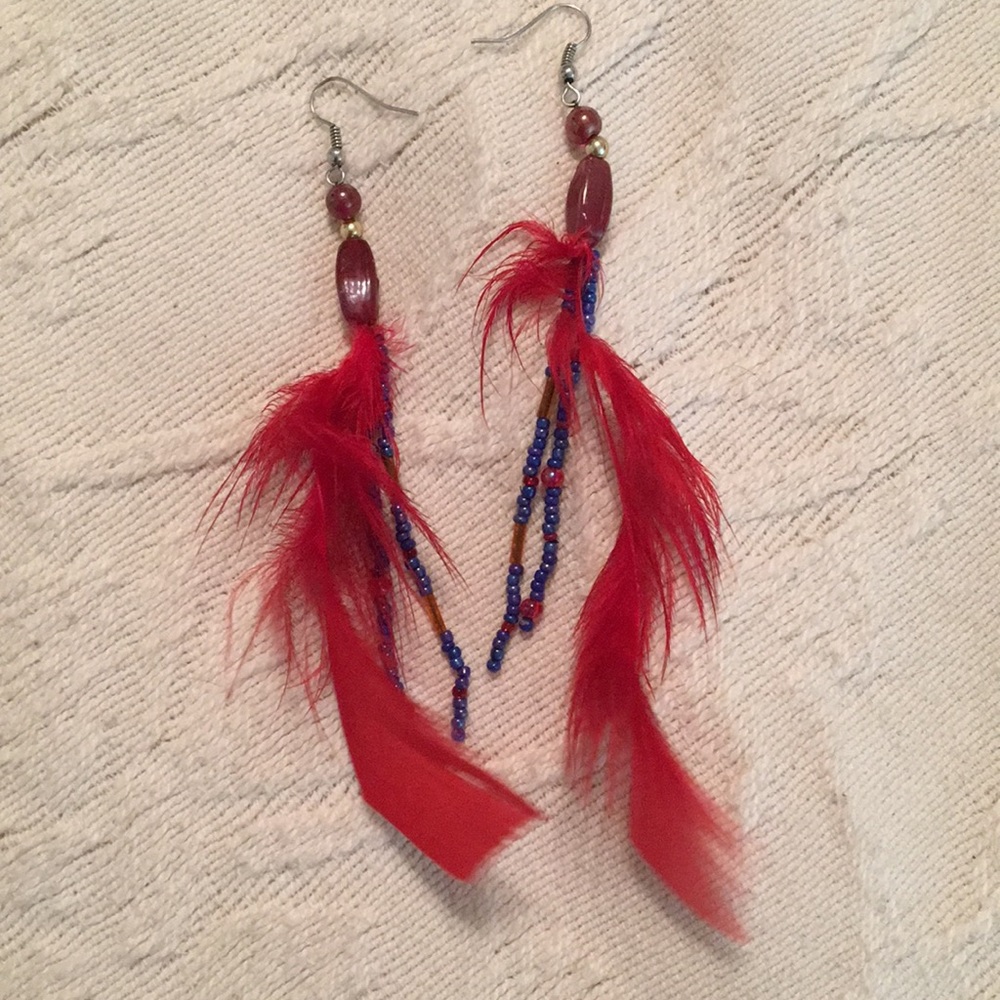 Red feather earrings